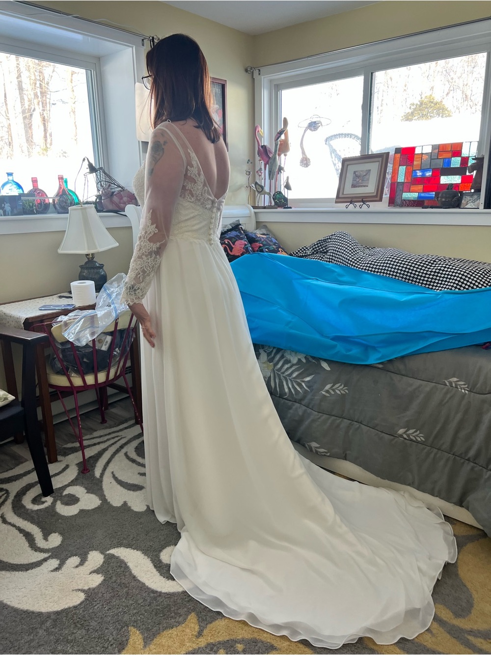 Elegant Long Sleeve Lace-Back Wedding Dress in Ivory